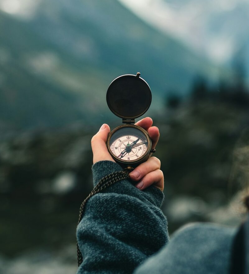 Photo by Ali Kazal person holding black round container